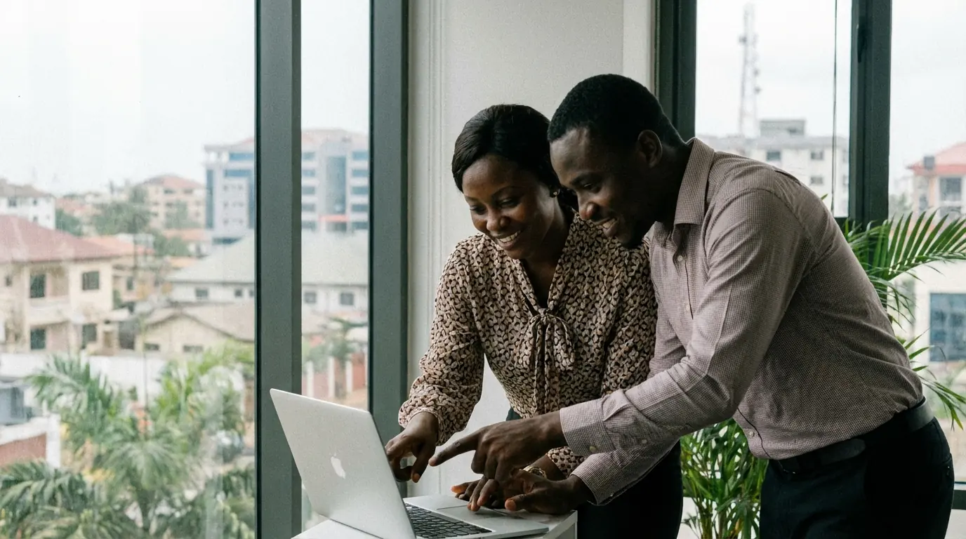Ghanaian business owner using SikaBooks